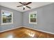 Bedroom with hardwood floors, ceiling fan and natural light at 4330 7Th N Ave, St Petersburg, FL 33713