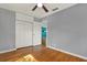 This is a bedroom with wooden floors and a large closet at 4330 7Th N Ave, St Petersburg, FL 33713