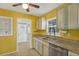 Bright kitchen features granite counters, stainless steel appliances, and a stainless sink at 4330 7Th N Ave, St Petersburg, FL 33713