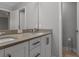 Bright bathroom with double vanity featuring modern fixtures, plenty of counter space, and convenient toilet location at 444 49Th N St, St Petersburg, FL 33710
