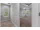 Bedroom entrance featuring neutral carpet and multiple windows providing ample natural light at 444 49Th N St, St Petersburg, FL 33710