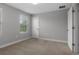 Bedroom with neutral paint, carpet, and a window providing natural light at 444 49Th N St, St Petersburg, FL 33710