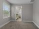 Neutral bedroom, well-lit from large window and featuring an ensuite bathroom at 444 49Th N St, St Petersburg, FL 33710