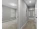 Hallway providing seamless transition between rooms with a glimpse into two additional bedrooms at 444 49Th N St, St Petersburg, FL 33710