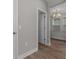 Open doorway to a living room with hardwood floors and a chandelier at 444 49Th N St, St Petersburg, FL 33710
