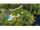 Aerial view of the Lansbrook community park featuring a lake and landscaped gardens at 4452 Bardsdale Dr, Palm Harbor, FL 34685