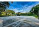 Community basketball court offers a fun and active gathering place at 4452 Bardsdale Dr, Palm Harbor, FL 34685