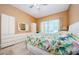 Comfortable main bedroom with an abundance of storage space and sliding doors to the outdoors at 4452 Bardsdale Dr, Palm Harbor, FL 34685