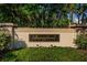 The community has a stately entrance sign at 4452 Bardsdale Dr, Palm Harbor, FL 34685