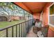 Relaxing balcony with comfortable seating and a view of the surrounding landscape at 4805 Alt 19 # 421, Palm Harbor, FL 34683