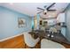 Cozy dining area with a kitchen view, wood floors, and seating for six, great for gatherings at 4805 Alt 19 # 421, Palm Harbor, FL 34683