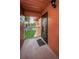 Cozy front entrance with a welcome mat and a view of the greenery at 4805 Alt 19 # 421, Palm Harbor, FL 34683