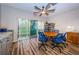 Conference room with table, chairs, and sliding doors leading to outside at 4805 Alt 19 # 421, Palm Harbor, FL 34683