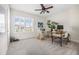 Bright home office with ample workspace, a large window, and neutral tones for a productive environment at 4808 Jackson Club Loop, Tampa, FL 33624
