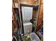 A compact laundry area with a stacked washer and dryer unit for convenience at 4851 W Gandy Blvd # B3L12, Tampa, FL 33611