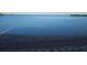 Calm ocean view near brick paver pathway and seawall for scenic strolls at 4851 W Gandy Blvd # B3L12, Tampa, FL 33611