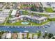 Overhead view of the waterfront condo community, showcasing lush landscaping, a pool, and canal access for boating at 5157 Silent Loop # 214, New Port Richey, FL 34652
