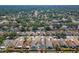 Wide aerial view of a neighborhood with a variety of homes, mature trees, and green spaces at 518 Royal Ridge St, Valrico, FL 33594