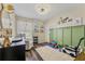 Bright Bedroom with wood-look floors, neutral paint and whimsical decor at 518 Royal Ridge St, Valrico, FL 33594
