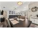 Open dining area with stylish light fixture and view into the comfortable living room at 518 Royal Ridge St, Valrico, FL 33594