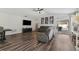 Cozy living room with wood floors, recessed lighting, and sliding glass doors to the patio at 518 Royal Ridge St, Valrico, FL 33594