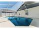 Relaxing screened-in pool offers a refreshing escape and a private oasis in the backyard at 518 Royal Ridge St, Valrico, FL 33594