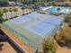 Aerial view of well-maintained community tennis courts, perfect for recreational play and fitness at 518 Royal Ridge St, Valrico, FL 33594