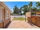 Spacious backyard featuring a hot tub, brick patio, and fenced yard at 5324 3Rd N Ave, St Petersburg, FL 33710