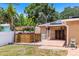Private backyard with hot tub, brick patio, solar panels, and privacy fence at 5324 3Rd N Ave, St Petersburg, FL 33710