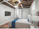 Bedroom with hardwood flooring, ceiling fan, and a wood plank accent ceiling at 5324 3Rd N Ave, St Petersburg, FL 33710