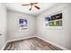 Bedroom with natural light from two windows and wood-look floors at 5324 3Rd N Ave, St Petersburg, FL 33710