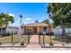 A charming fenced-in home with a well-maintained lawn and front garden at 5324 3Rd N Ave, St Petersburg, FL 33710