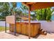 Outdoor hot tub on brick patio with pergola cover at 5324 3Rd N Ave, St Petersburg, FL 33710