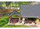 Aerial view of home with a covered patio, hot tub and spacious backyard that is great for entertaining at 5458 Zamia Dr, Brooksville, FL 34604