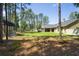 Large backyard with a shed and covered patio with hot tub that is great for Gathering fun and recreation at 5458 Zamia Dr, Brooksville, FL 34604