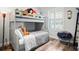 Cozy bedroom featuring a bunk bed and a plush chair, perfect for a room at 5458 Zamia Dr, Brooksville, FL 34604