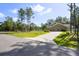 A long driveway leads to the home's convenient three-car garage at 5458 Zamia Dr, Brooksville, FL 34604