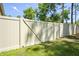 The backyard features a new fence providing a great deal of privacy at 5458 Zamia Dr, Brooksville, FL 34604