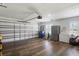 The garage features painted walls and floors, with windows for natural light at 5458 Zamia Dr, Brooksville, FL 34604