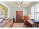 Charming office space with beautiful wood accents, vintage furniture, and natural light at 5458 Zamia Dr, Brooksville, FL 34604