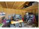 Interior of shed featuring wood framing and floor, shelf storage and plenty of room at 5458 Zamia Dr, Brooksville, FL 34604