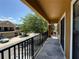 Balcony featuring a metal railing and neighborhood views at 5527 Kinglethill Dr, Lithia, FL 33547
