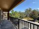 Balcony featuring a metal railing and community views at 5527 Kinglethill Dr, Lithia, FL 33547