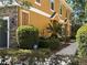 Side view of a multi-story home showcasing the landscape and exterior at 5527 Kinglethill Dr, Lithia, FL 33547