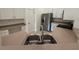 Modern kitchen featuring stainless steel appliances and counter seating at 5527 Kinglethill Dr, Lithia, FL 33547