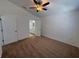Comfortable main bedroom with neutral carpet and an ensuite bathroom for added privacy and convenience at 5527 Kinglethill Dr, Lithia, FL 33547