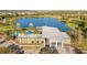 Picturesque community clubhouse and pool area offering a serene lakeside setting and modern amenities at 5539 Silver Sun Dr, Apollo Beach, FL 33572