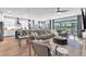 Spacious living room with a sectional sofa, modern decor, and open access to the kitchen at 5539 Silver Sun Dr, Apollo Beach, FL 33572