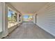 Expansive screened porch with views of the mature landscaping, providing ample outdoor living space at 5603 Palmetto Rd, New Port Richey, FL 34652