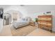 Bright bedroom featuring a neutral color palette, sloped ceilings, and stylish decor at 5610 N River Shore Dr, Tampa, FL 33603